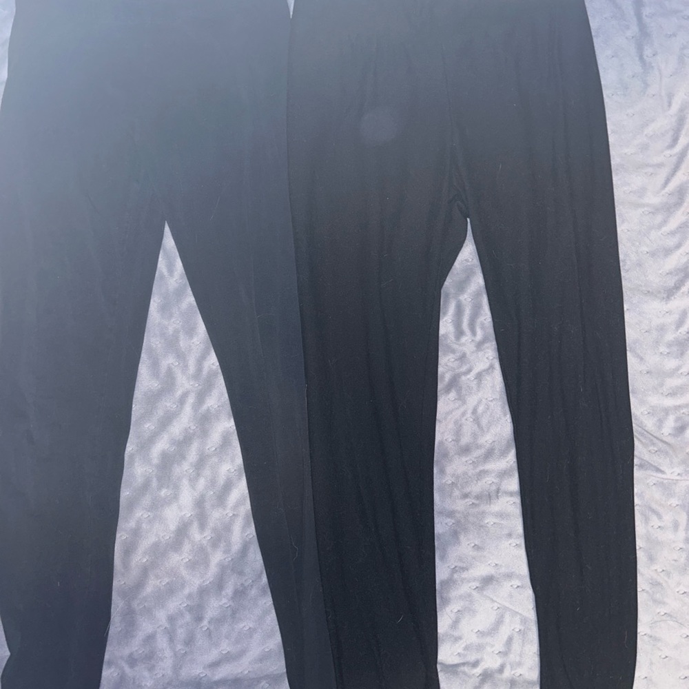 Two black leggings